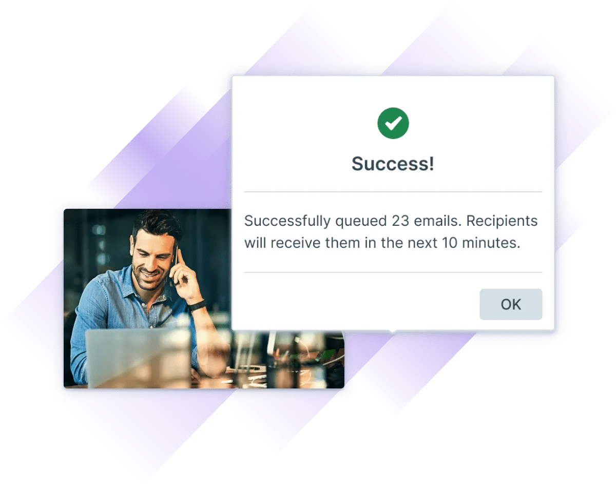 Screenshot showing a training admin seeing their emails get successfully sent to learners on a laptop while they are on the phone.