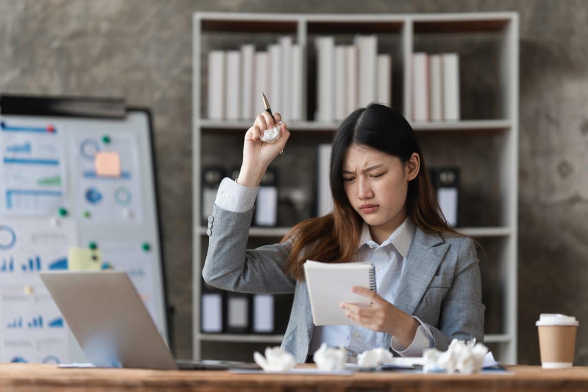 businesswoman finding a solution to a crisis.