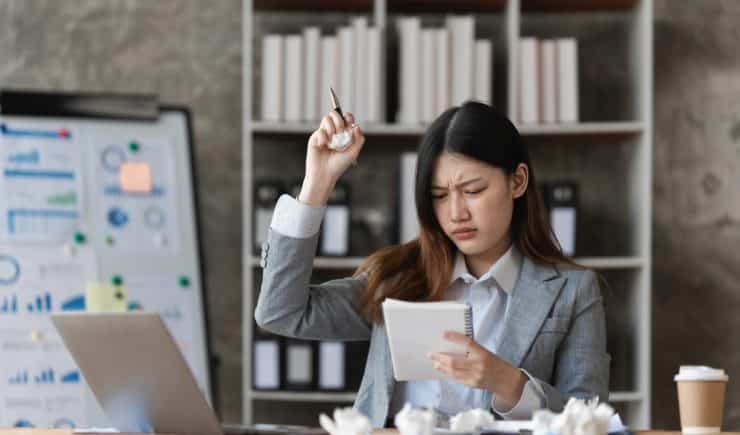 businesswoman finding a solution to a crisis.