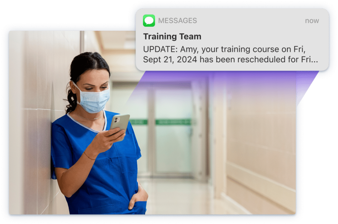 Screenshot of SMS text message sent from Administrate to a medical professional indicating a change in training.