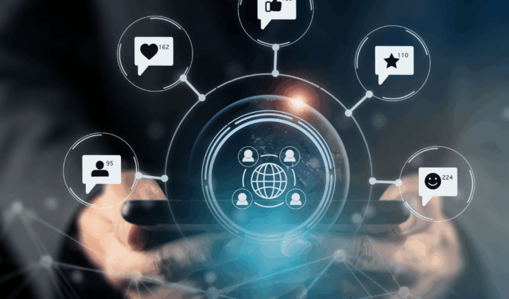 Automated training communication shown as a graphic, a hand holding expanding communication, email, and sms symbols