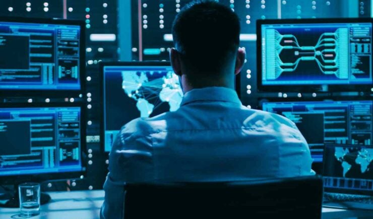 AI engineer fixes learning technology at a desk